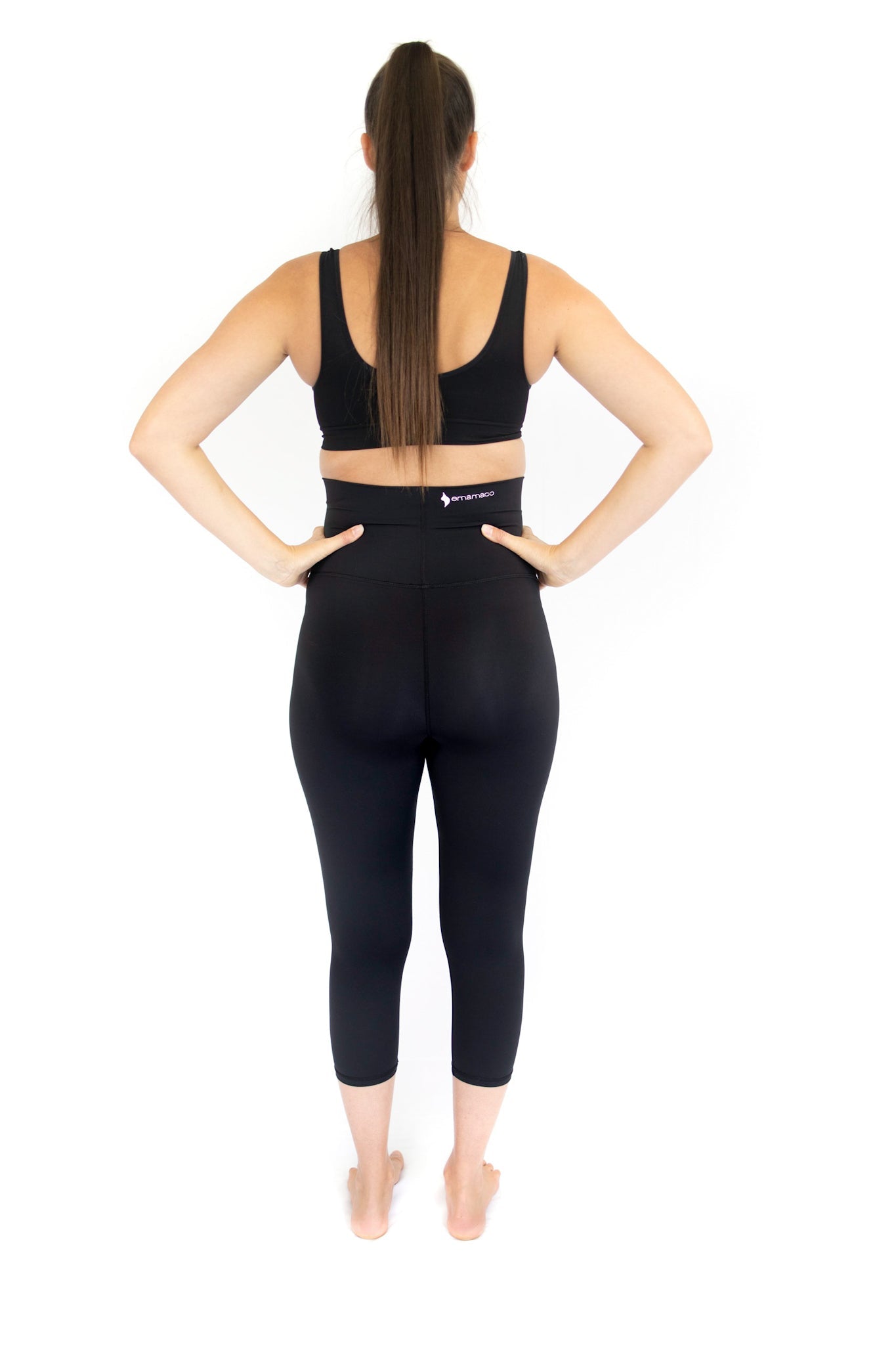 Woman in black workout attire showcasing completely specialised Maternity Leggings