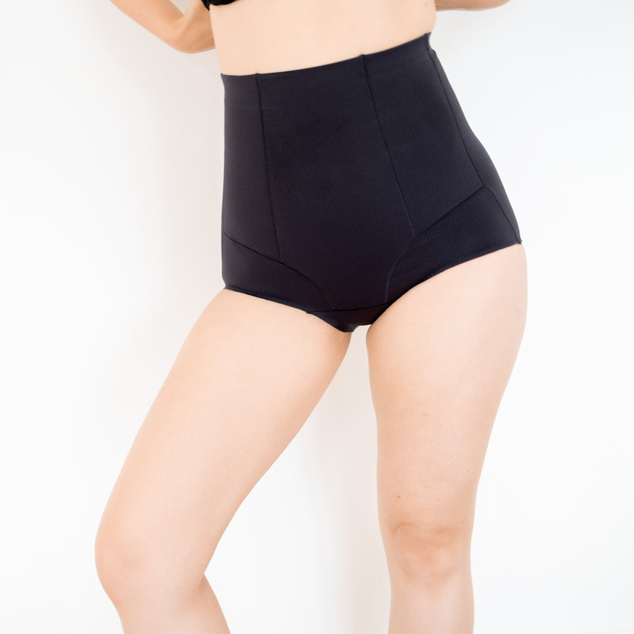 High-waisted black shapewear briefs from Emama, ideal for sleek control at 3rd half price